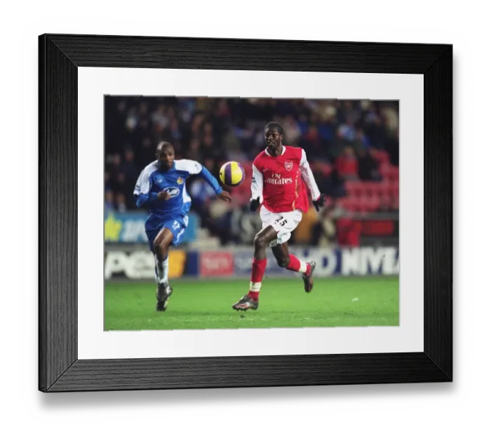 Framed Print : Emmanuel Adebayor's Breakthrough Goal: Arsenal's 1-0 Victory over Wigan, FA Premiership, 2006