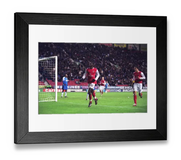 Framed Print : Adebayor's Thriller: The First Goal Against Wigan (13 / 12 / 06) Framed Print : Adebayor's Thriller: The First Goal Against Wigan (13 / 12 / 06)