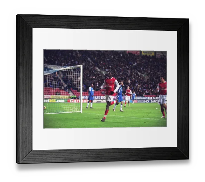 Framed Print : Adebayor's Goal Celebration: Arsenal's 1-0 Win Over Wigan, FA Premiership, 2006