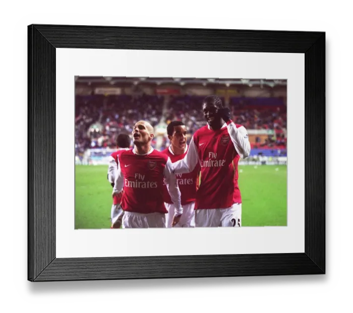 Framed Print : Adebayor and Walcott-Ljungberg: Celebrating Arsenal's Win at Wigan (December 2006) Framed Print : Adebayor and Walcott-Ljungberg: Celebrating Arsenal's Win at Wigan (December 2006)