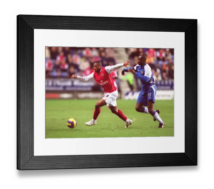 Framed Print : Julio Baptista Scores the Winner: Arsenal's 1-0 Victory over Wigan, December 13, 2006 Framed Print : Julio Baptista Scores the Winner: Arsenal's 1-0 Victory over Wigan, December 13, 2006