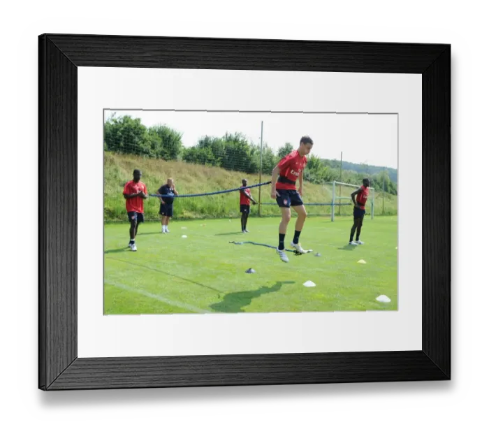 Framed Print : Arsenal's Koscielny in Focus at 2010 Training Camp, Austria Framed Print : Arsenal's Koscielny in Focus at 2010 Training Camp, Austria