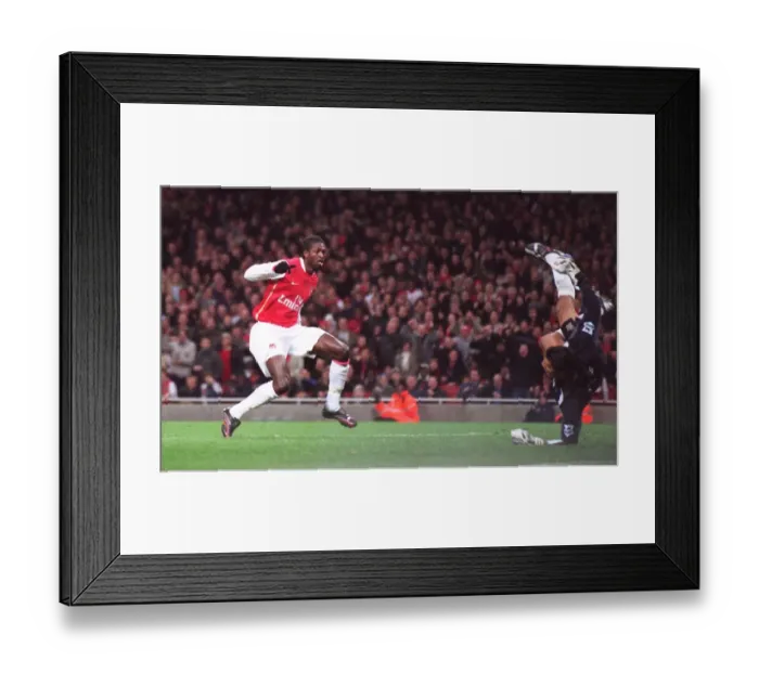 Framed Print : Adebayor Stuns Portsmouth: First Arsenal Goal in Emirates Thriller