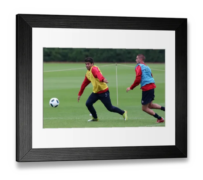 Framed Print : Eduardo and Herni Lansbury (Arsenal). Arsenal Training Session. Arsenal Training Ground Framed Print : Eduardo and Herni Lansbury (Arsenal). Arsenal Training Session. Arsenal Training Ground