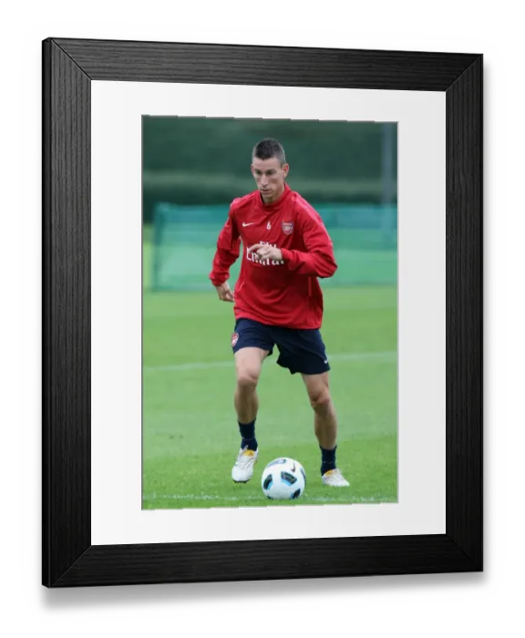 Framed Print : Arsenal Football Club: Laurent Koscielny at Training, Pre-Season 2010-11 Framed Print : Arsenal Football Club: Laurent Koscielny at Training, Pre-Season 2010-11