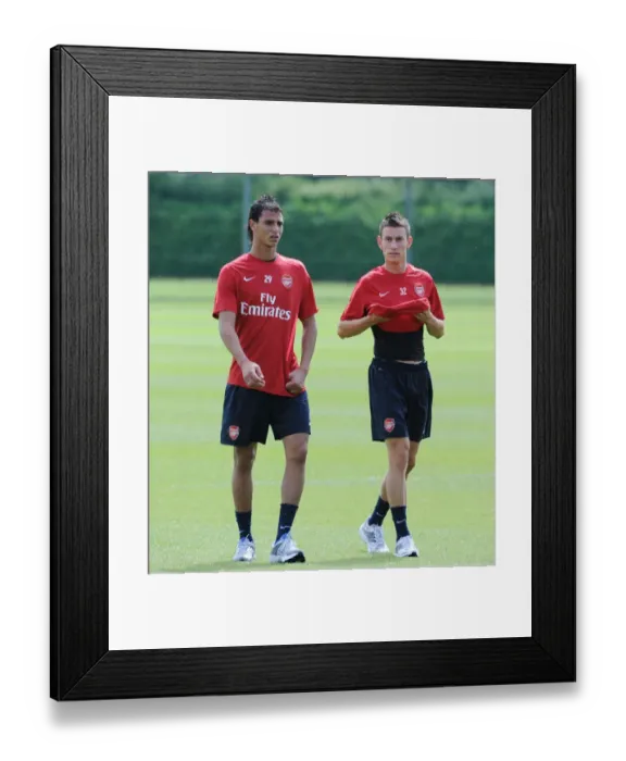 Framed Print : Laurent Koscielny Marouane Chamakh (Arsenal). Arsenal Training Ground, London Colney Framed Print : Laurent Koscielny Marouane Chamakh (Arsenal). Arsenal Training Ground, London Colney