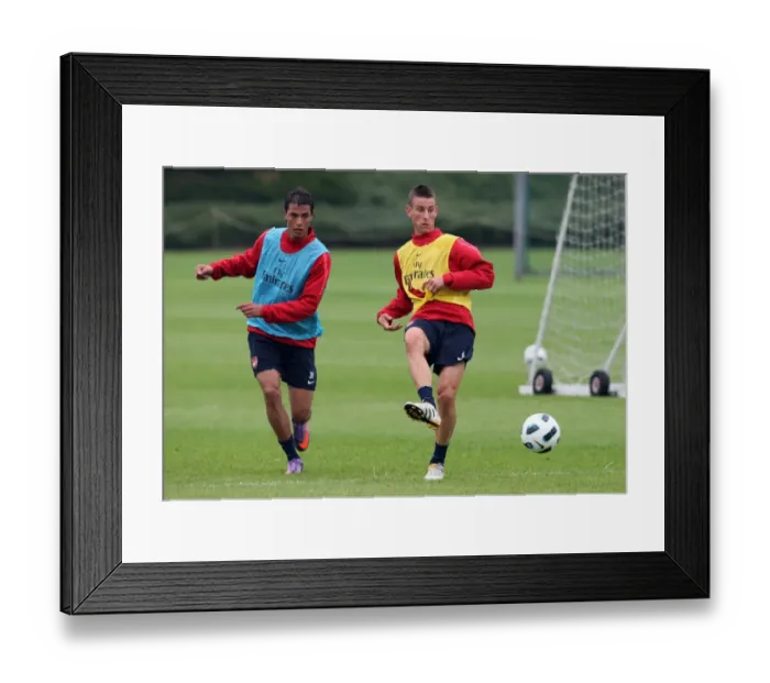 Framed Print : Laurent Koscielny and Marouane Chamakh (Arsenal). Arsenal Training Session Framed Print : Laurent Koscielny and Marouane Chamakh (Arsenal). Arsenal Training Session