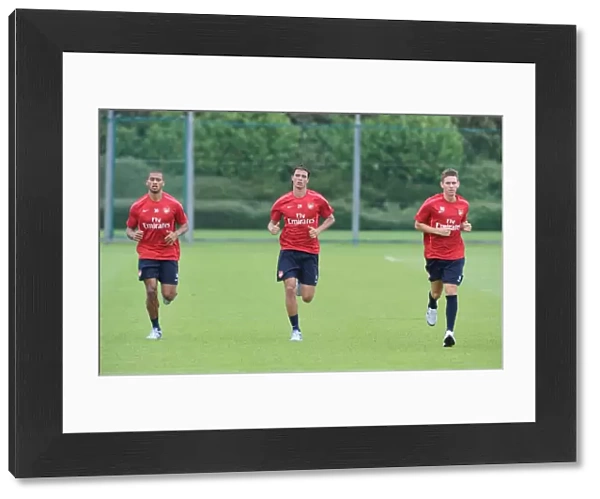 Armand Traore, Maraoune Chamakh and Mark Randall(Arsenal). Arsenal Training Ground