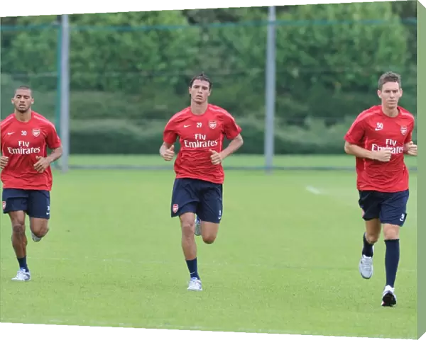 Armand Traore, Maraoune Chamakh and Mark Randall(Arsenal). Arsenal Training Ground
