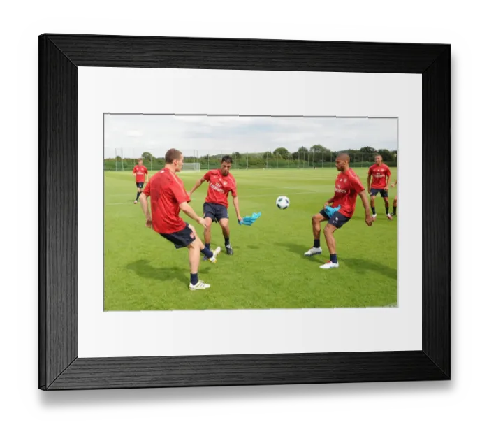 Framed Print : Thomas Vermaelen Marouane Chamakh and Armand Traore (Arsenal). Arsenal Training Ground