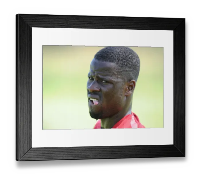 Framed Print : Arsenal Football Club: Emmanuel Eboue at Pre-Season Training, Austria 2010 Framed Print : Arsenal Football Club: Emmanuel Eboue at Pre-Season Training, Austria 2010