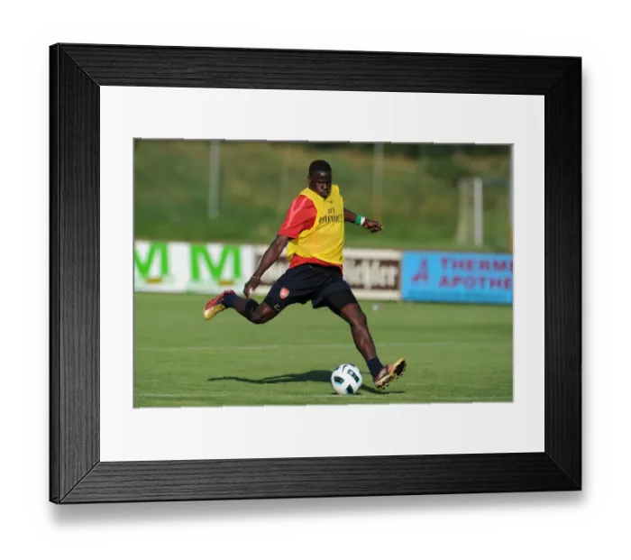 Framed Print : Arsenal Football Club: Emmanuel Eboue at 2010 Pre-Season Training, Austria Framed Print : Arsenal Football Club: Emmanuel Eboue at 2010 Pre-Season Training, Austria