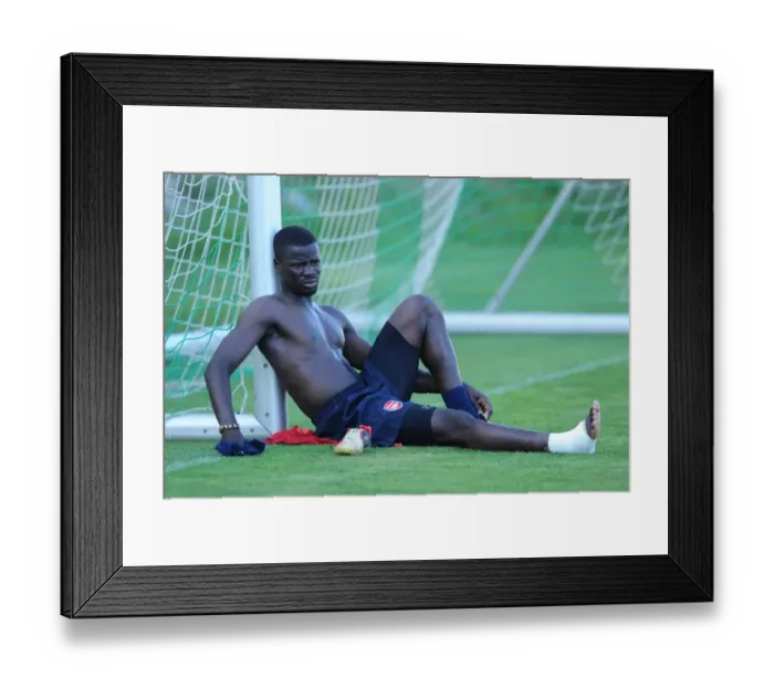 Framed Print : Arsenal Football Club: Emmanuel Eboue at 2010 Pre-Season Training, Austria