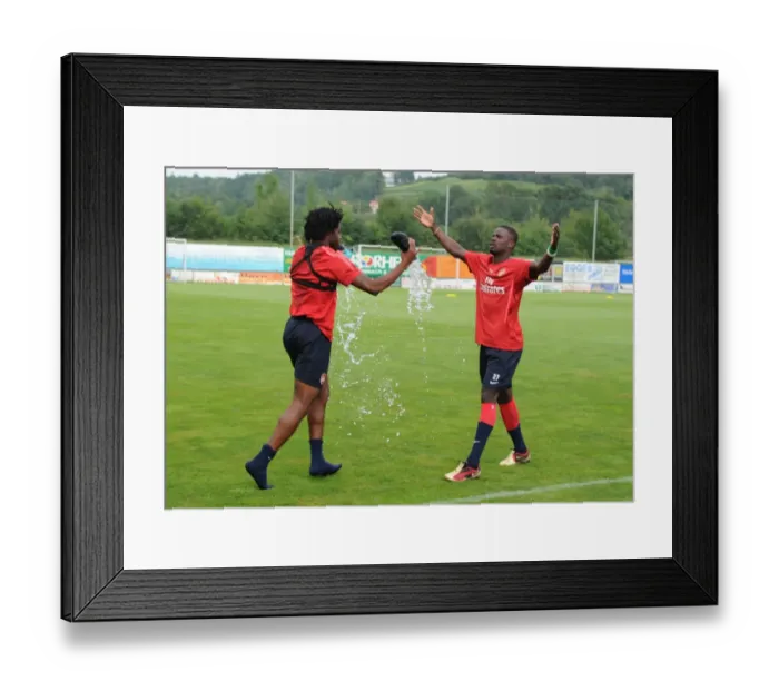 Framed Print : Emmanuel Eboue and Alex Song (Arsenal). Arsenal Training Camp, Bad Waltersdorf