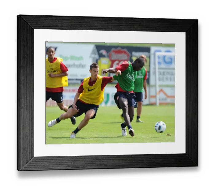Framed Print : Emmanuel Frimpong and Laurent Koscielny (Arsenal). Arsenal Training Camp Framed Print : Emmanuel Frimpong and Laurent Koscielny (Arsenal). Arsenal Training Camp