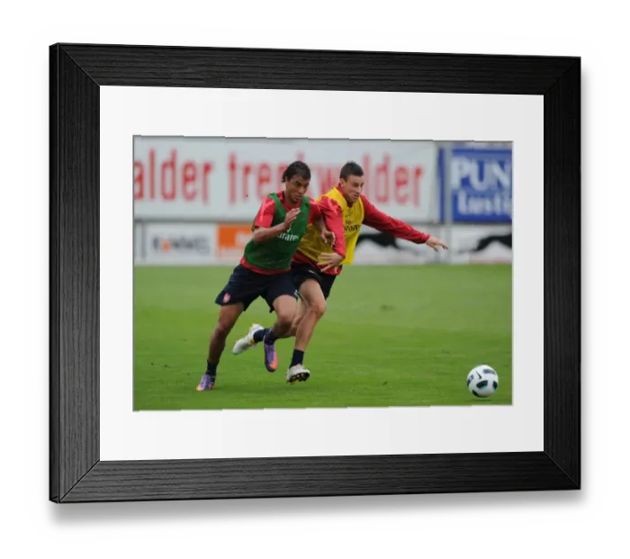 Framed Print : Marouane Chamakh and Laurent Koscielny (Arsenal). Arsenal Training Camp