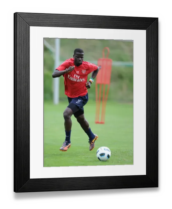 Framed Print : Arsenal's Emmanuel Eboue at Training Camp, Austria, 2010