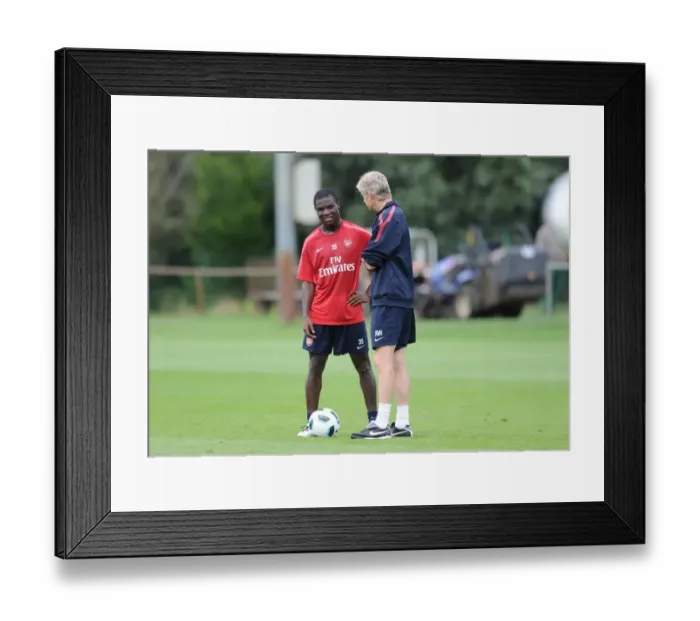 Framed Print : Arsenal manager Arsene Wenger with Emmanuel Frimpong. Arsenal Training Camp