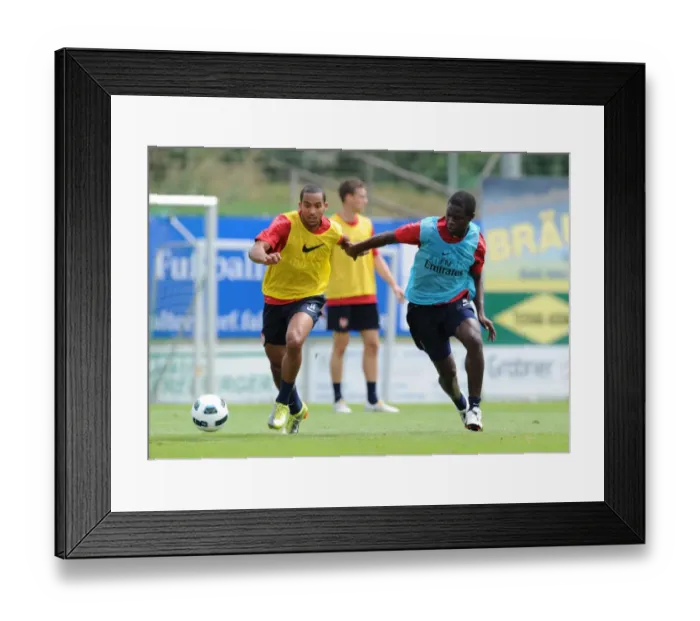 Framed Print : Theo Walcott and Emmanuel Frimpong (Arsenal). Arsenal Training Camp, Bad Waltersdorf