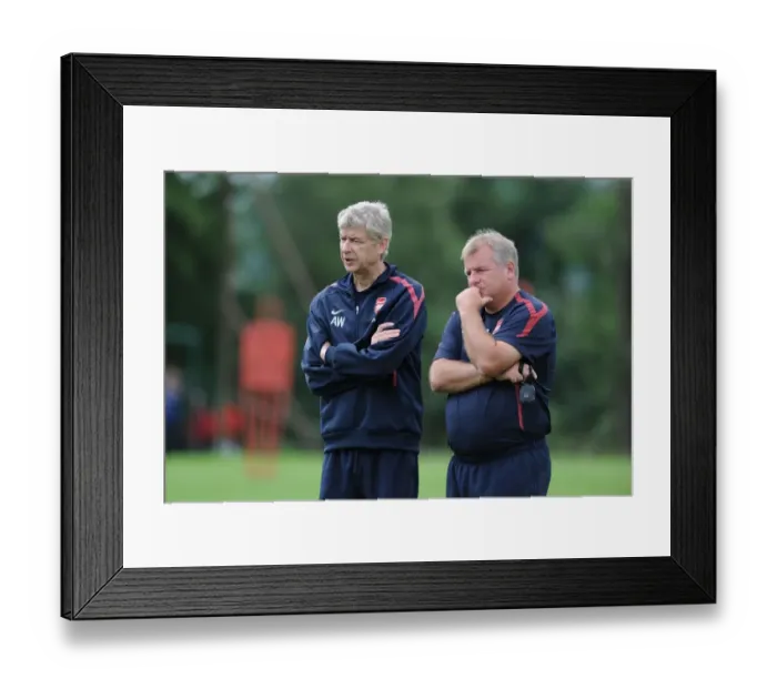 Framed Print : Arsenal manager Arsene Wenger with coach Neil Banfield. Arsenal Training Camp Framed Print : Arsenal manager Arsene Wenger with coach Neil Banfield. Arsenal Training Camp