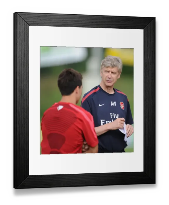 Framed Print : Arsenal manager Arsene Wenger with Samir Nasri. Arsenal Training Camp, Bad Waltersdorf Framed Print : Arsenal manager Arsene Wenger with Samir Nasri. Arsenal Training Camp, Bad Waltersdorf