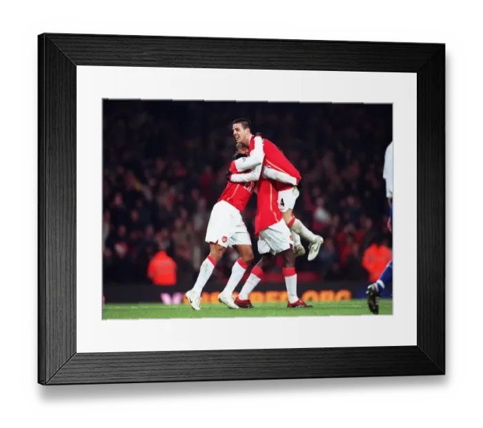 Framed Print : Cesc Fabregas celebrates setting up the 6th Arsenal goal with Julio Baptista Framed Print : Cesc Fabregas celebrates setting up the 6th Arsenal goal with Julio Baptista