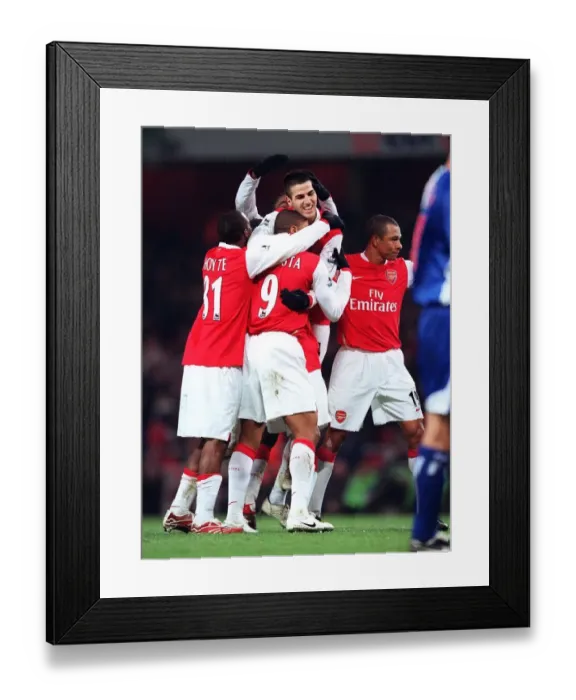 Framed Print : Cesc Fabregas celebrates setting up Arsenals 6th goal with Julio Baptista