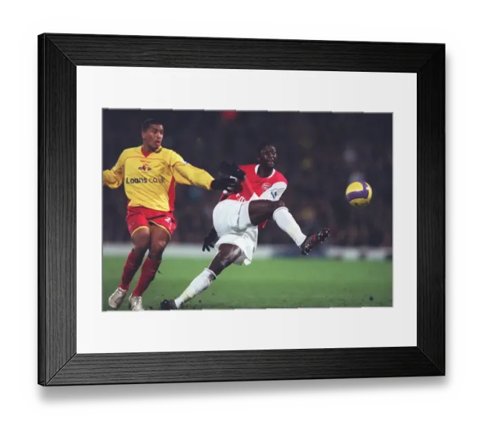 Framed Print : Adebayor's Double: Arsenal Edge Past Watford 2-1 in The Barclays Premiership, December 2006 Framed Print : Adebayor's Double: Arsenal Edge Past Watford 2-1 in The Barclays Premiership, December 2006