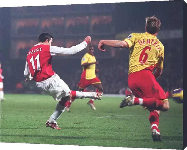 Robin van Persie shoots past Watford goalkeeper Ben Foster the score the 2nd Arsenal goal