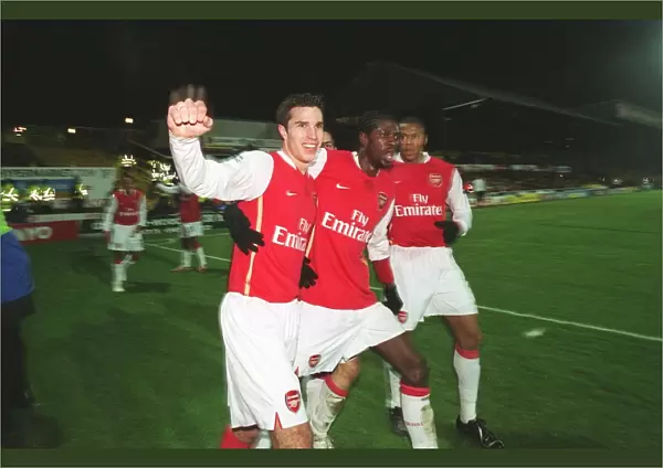 Van Persie, Adebayor, and Baptista: Celebrating a Winning Goal for Arsenal at Vicarage Road (2006)