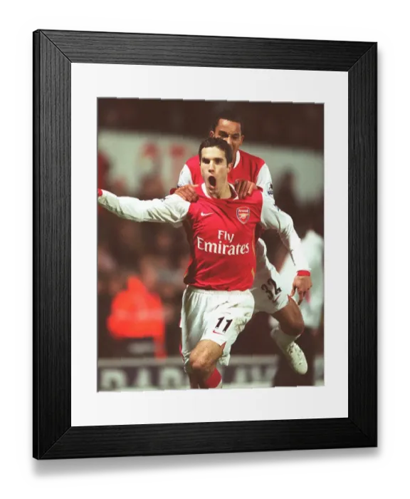 Framed Print : Van Persie and Walcott's Unforgettable Moment: Arsenal's Winning Goals at Watford (2006) Framed Print : Van Persie and Walcott's Unforgettable Moment: Arsenal's Winning Goals at Watford (2006)