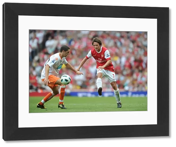 Tomas Rosicky (Arsenal) Neal Eardley (Blackpool). Arsenal 6: 0 Blackpool
