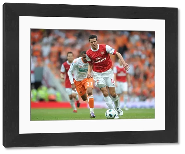 Robin van Persie (Arsenal) Ishmel Demontagnac (Blackpool). Arsenal 6: 0 Blackpool