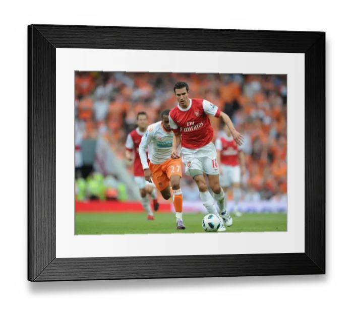 Framed Print : Robin van Persie (Arsenal) Ishmel Demontagnac (Blackpool). Arsenal 6: 0 Blackpool