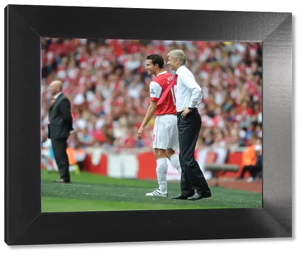 Arsenal manager Arsene Wenger with substitute Robin van Persie. Arsenal 6: 0 Blackpool