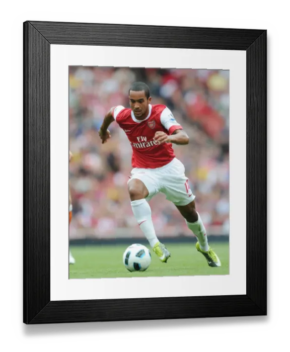 Framed Print : Theo Walcott (Arsenal). Arsenal 6: 0 Blackpool, Barclays Premier League