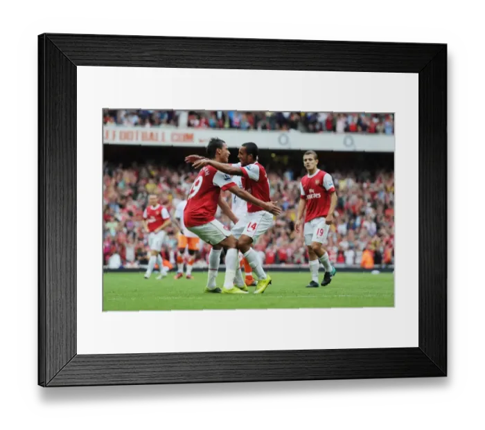 Framed Print : Theo Walcott celebrates scoring the 3rd Arsenal goal with Marouane Chamakh Framed Print : Theo Walcott celebrates scoring the 3rd Arsenal goal with Marouane Chamakh