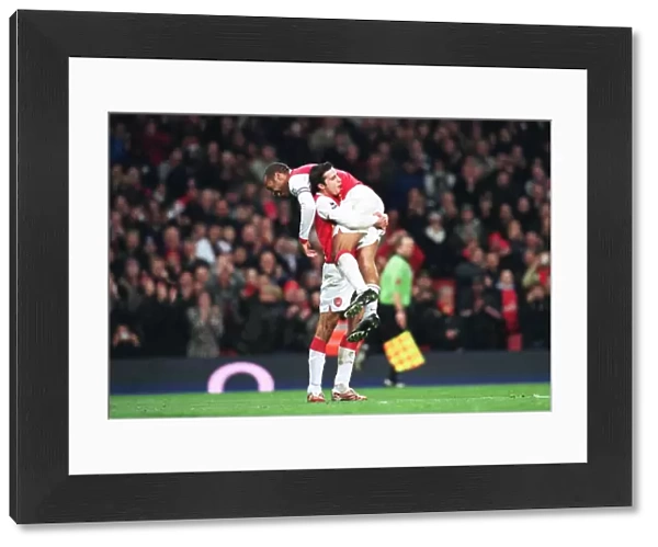 Robin van Persie celebrates scoring his 1st goal Arsenals 3rd from the penalty spot with Thierry Henry. Arsenal 4: 0 Charlton Athletic. FA Premiership. Emirates Stadium, London, 2  /  1  /  07. Credit: Arsenal Football Club  / 