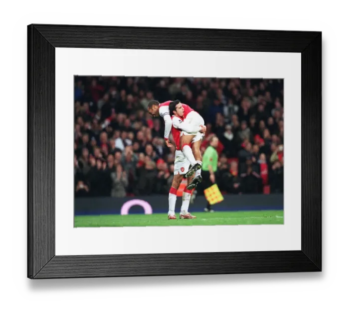 Framed Print : Robin van Persie celebrates scoring his 1st goal Arsenals 3rd from the penalty spot with Thierry Henry. Arsenal 4: 0 Charlton Athletic. FA Premiership. Emirates Stadium, London, 2  /  1  /  07. Credit: Arsenal Football Club  / 