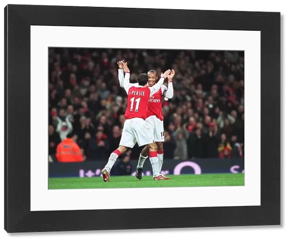 Robin van Persie celebrates scoring his 1st goal Arsenals 3rd from the penalty spot with Thierry Henry. Arsenal 4: 0 Charlton Athletic. FA Premiership. Emirates Stadium, London, 2  /  1  /  07. Credit: Arsenal Football Club  / 