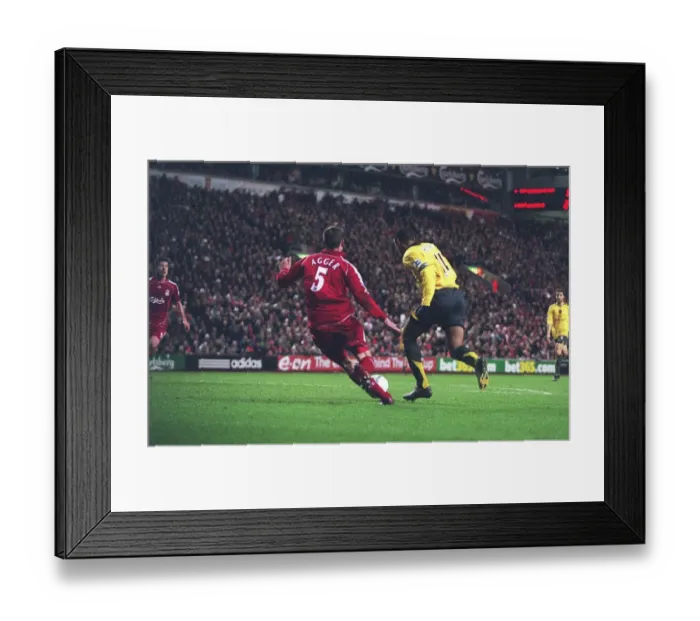 Framed Print : Thierry Henry breaks past Liverpool defender Daniel Agger to score the 3rd Arsenal goal