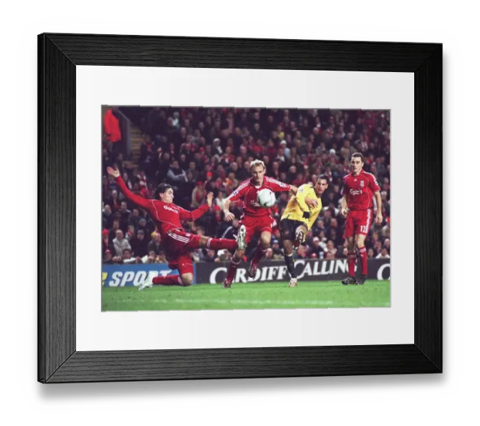 Framed Print : Jermie Aliadiere (Arsenal) shoots under pressure from Sami Hyypia