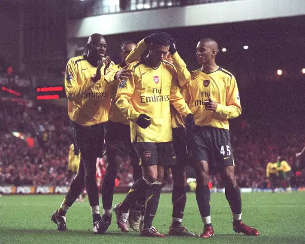 Jeremie Aliadiere is congratulated by Abou Diaby and Armand Traore for setting up Julio Baptista for Arsenals 6th goal. Liverpool 3: 6 Arsenal. Catling Cup 5th Round. Anfield, Liverpool, 9  /  1  /  07. Credit: Arsenal Football Club  / 
