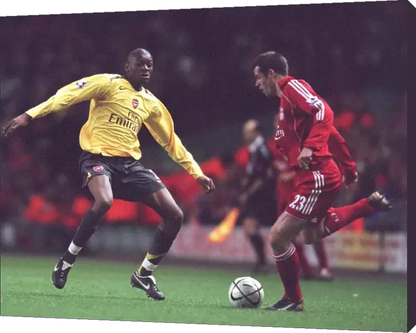 Abou Diaby (Arsenal) Jamie Carragher (Liverpool)