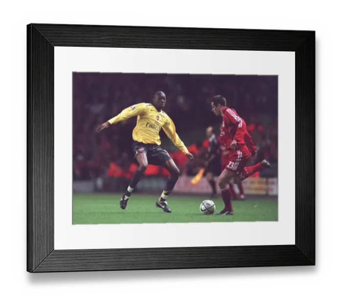 Framed Print : Abou Diaby (Arsenal) Jamie Carragher (Liverpool) Framed Print : Abou Diaby (Arsenal) Jamie Carragher (Liverpool)