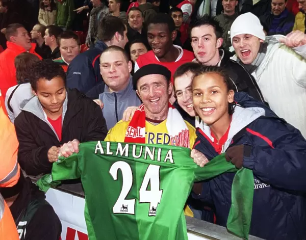 Arsenal fans with Manuel Almunias shirt after the match