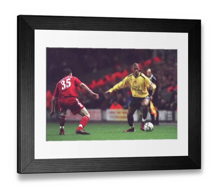 Framed Print : Armand Traore (Arsenal) Danny Guthrie (Liverpool) Framed Print : Armand Traore (Arsenal) Danny Guthrie (Liverpool)