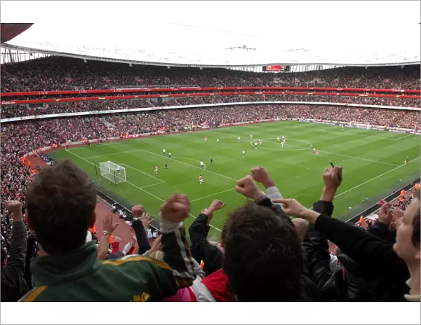 Arsenal Fans Go Wild: Celebrating Adebayor's Goal Against Tottenham