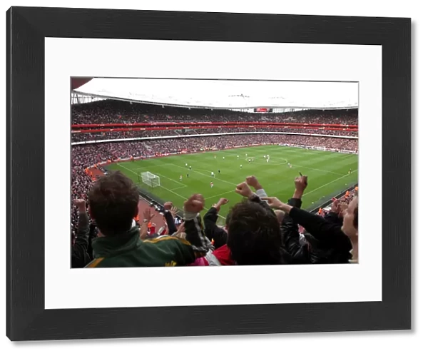 Arsenal Fans Go Wild: Celebrating Adebayor's Goal Against Tottenham