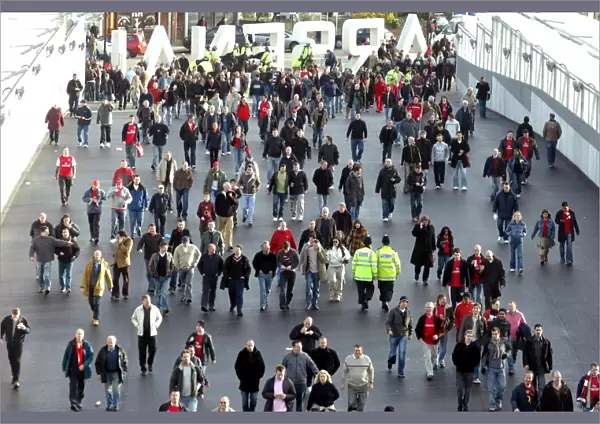 Fans use the Clock End Bridge to get to the stadium